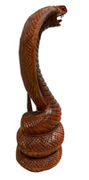 Wooden carved snakes