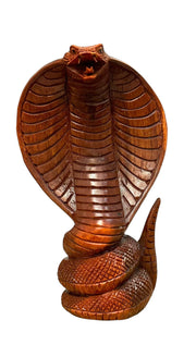 Wooden carved snakes